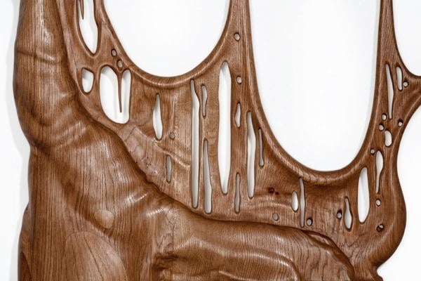 The beautiful glossy finish of this surrealist wood sculpture by ...