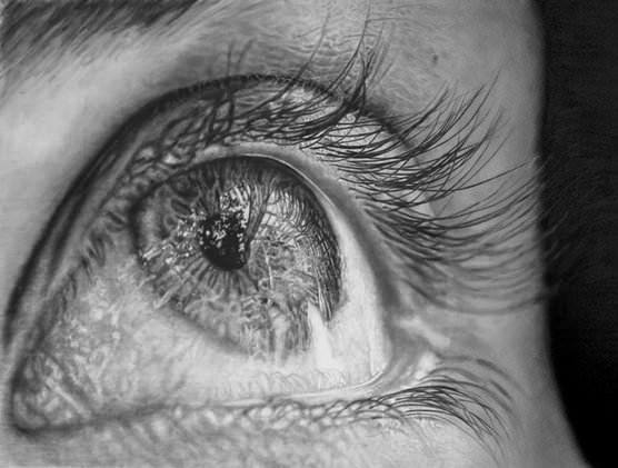 This photorealistic pencil drawing of an eye is by the amazingly talented South African artist Jono Dry