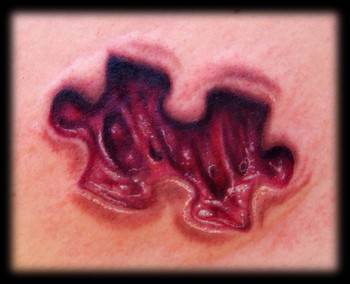 jigsaw skin removel tattoo design gross xray funny