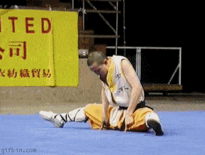  A shaolin monk performs an amazing stunt, a handstand on only two fingers