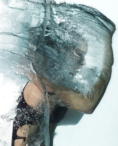girl against a wall of water iain crawford photography visual illusion model woman