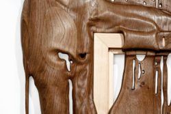 A close up of the contrast between two different types of wood in a Bonsoir Paris melting wood sculpture