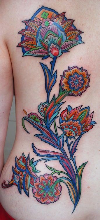 A paisley inspired tattoo design by Barbara Swingaling of brightly colored flowers