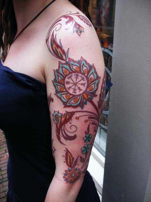 Barbara Swingaling creates a unique tattoo based on henna and paisley designs