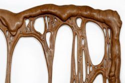 Wood tears like hot toffee in this surreal melting wood sculpture by French artist Bonsoir Paris