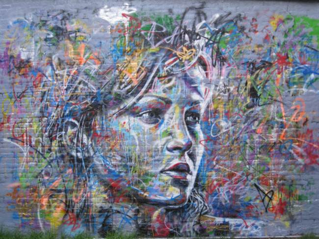 A beautiful girl becomes the subject for this graffit art portrait by london artist David Walker
