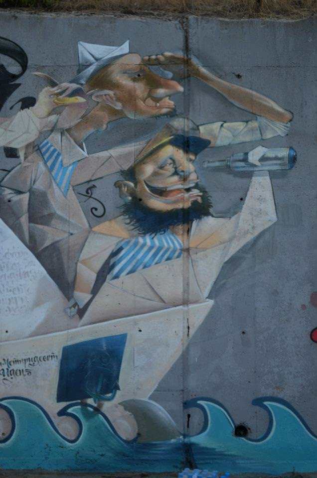 Graffiti art team 140 Ideas merge their art styles to create a funny street art mural of two sailors