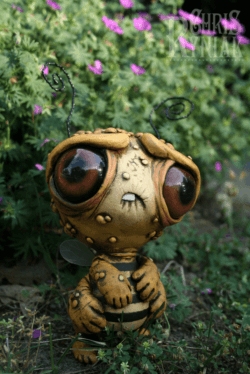 American artist Chris Ryniak creates amonster art doll of a bee born in a nuclear world