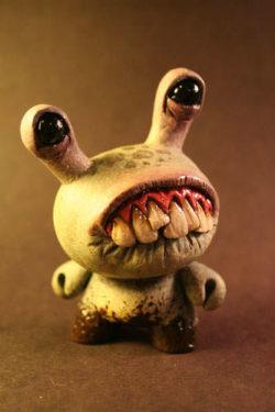 This cute little monster art doll by Chris Ryniak looks set on creating a bit of alien mischief