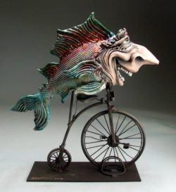 Not quite a mermaid, this caricature clay sculpture by Mitchell Grafton features a colorful fish and a funny face