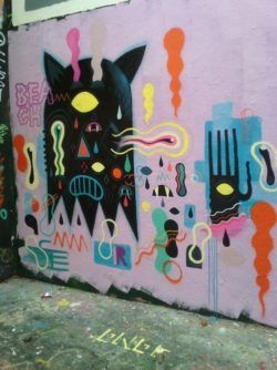 French artist Niark1 creates a geometric monster in this colorful graffiti mural
