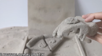 Kluna Tik eats a pizza made of sand in this crazy fun food video